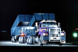 A double-exposure experiment to show decks up-decks down on this CH Mack OP5229 six wheeler and four axle trailer working for Alex Transport.
Alex had some great gear in the day and this alloy bullbar shod beauty was one of the stars...