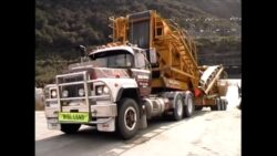 Road Metal Macks working in Fiordland on the most remote road in NZ... Legacy - Road Metals Deep Cove