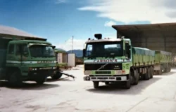 The fert shed in action - one of Carsons's eight-wheeler FL10 Volvo tippers, along with its three axle trailer getting ready to resupply the fert shed.